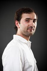 Obraz premium Young man isolated on gray background