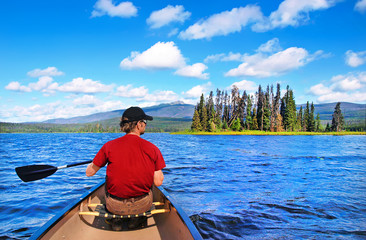 Canoeing on a lake in the wilderness of British Columbia, Canada