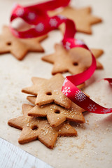 Gingerbread stars on bakery paper