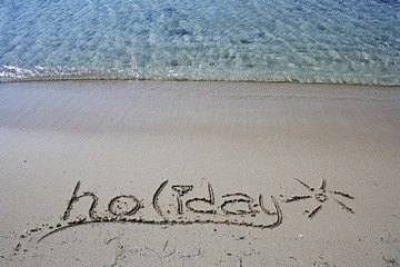 Holiday writing on beach of Bozcaada (Tenedos)in Aegean Sea