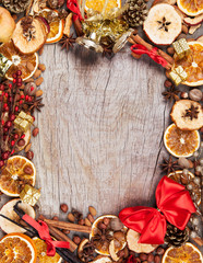Christmas spices with dry orange and apple slices 