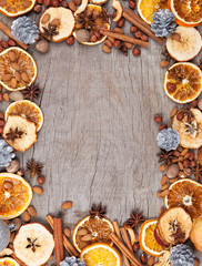 Christmas spices with dry orange and apple slices 