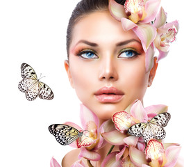 Beautiful Girl With Orchid Flowers and Butterfly