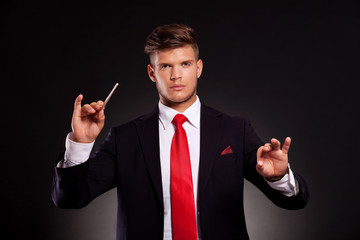 business man conducting orchestra © Viorel Sima