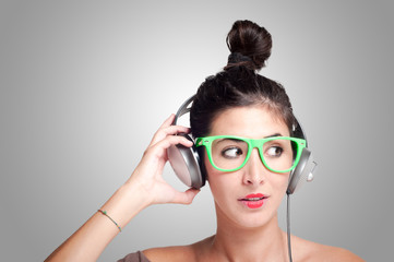 beautiful girl listening to music with headphones