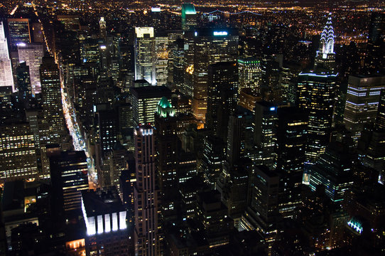 Fototapeta Manhattan de nuit, depuis l'Empire State building - New York USA