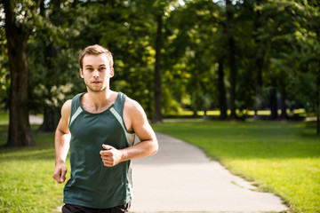 Jogging - man running in nature