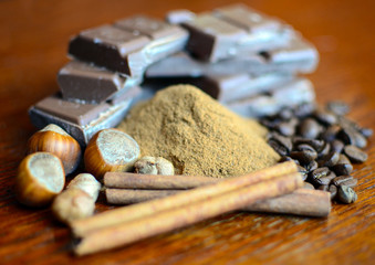 Chocolate with coffee beans cocoa and hazelnuts