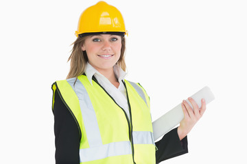 Female architect holding a plan