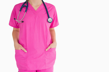 Woman in pink scrubs