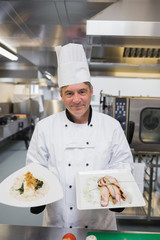Chef presenting two dishes