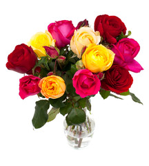 bunch of different roses in a glass vase