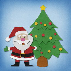Santa claus  recycled paper craft on paper background.