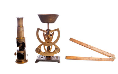 Antique scales, scale, microscope, isolated on white.