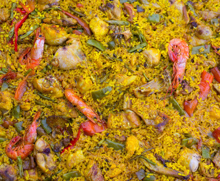 Spanish rice paella mixed of meat and seafood