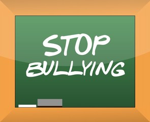 stop bullying text written on a blackboard