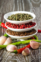 White bowls with spices and garlic