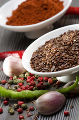 White bowls with spices and garlic