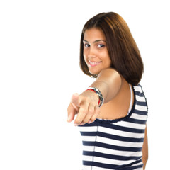 Portrait of young woman pointing with one finger