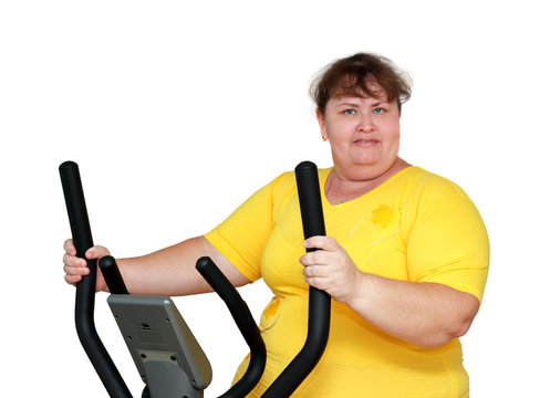 overweight woman exercising on trainer