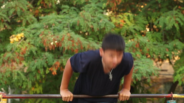 teenager doing pull ups 2