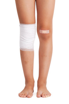 Injured foot in bandages and plaster