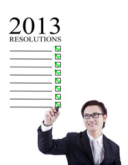 Businessman 2013 resolutions isolated in white