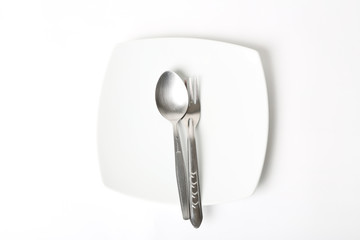 Cutlery Set with plate. On white background
