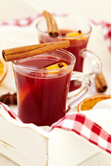 Mulled wine with spices and slice of orange