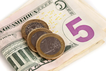 Dollar bills and coins close-up