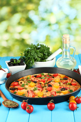 colorful composition of delicious pizza, vegetables and spices