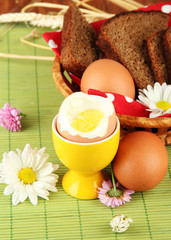 Boiled eggs on color background