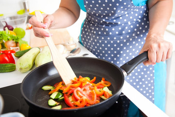 Mature woman on the kitchen