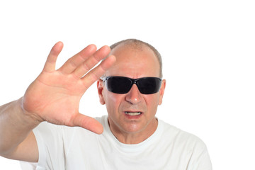 man with sunglasses making a sign