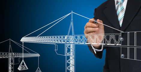 Business man drawing tower crane