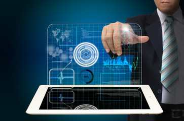 Hand of Business man touch virtual interface on tablet computer