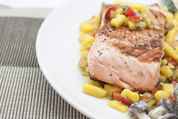 Grill salmon with mango sauce.