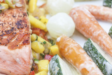 Grill salmon with mango sauce.