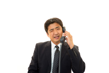 Naklejka premium 困惑した表情のビジネスマン