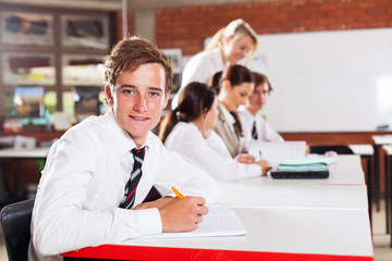 male teenage high school student in classroom