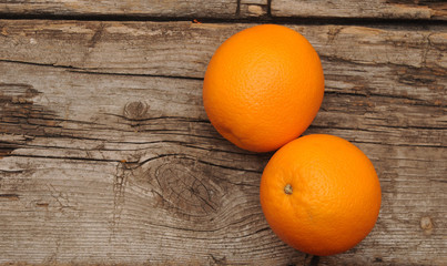 Fresh sweet orange on wooden background
