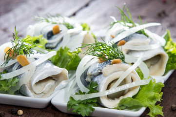 Fresh made Rollmop on a plate