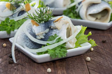 Fresh made Rollmop on a plate
