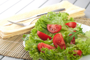 Fresh salad with tomatoes and salad