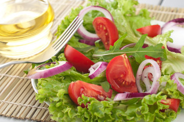 Fresh salad with tomatoes and onion