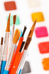 Fototapeta premium paints with brushes
