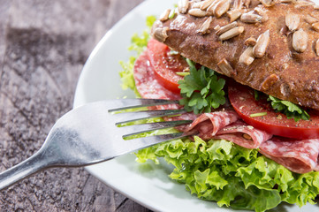 Fresh made Salami Sandwich on wood
