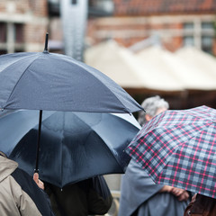 Touristen im Regen