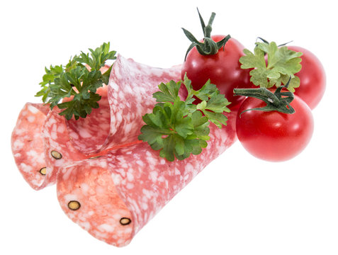 Salami slices isolated on white