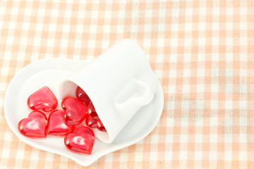 Red heart and heart shaped coffee cup